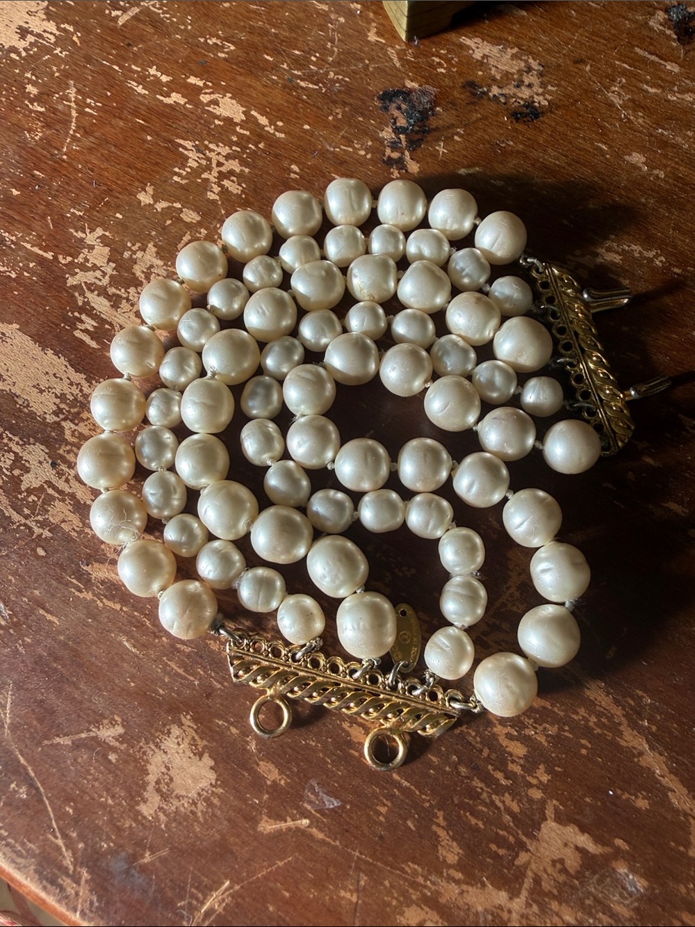 CHANEL Five-Strand Pearl Bracelet with Gold Hardware